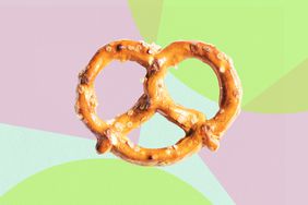 Macro shot of mini pretzel on designed background
