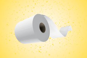 a photo of a roll of toilet paper flying